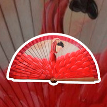 Cargar imagen en el visor de la galería, Abanico estrella para los amantes del arte flamenco. El abanico Dança Lolé captura la imagen pintada a mano de una erguida bailaora con cabeza firme y alegre atuendo. La cual pretende transportarnos a un ambiente de baile, alegría, sonido entre palmas y guitarras a ritmo de música tradicional de nuestra tierra con tanto encanto.