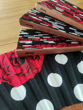 Cargar imagen en el visor de la galería, Los estampados son los protagonistas en este atractivo abanico y sus clásicas versiones dan un giro con este combo de lunares y rosas rojas entre lo tradicional y lo moderno. Ver la vida a lunares es sinónimo de alegría y de tener un gusto especial que con el atrevido mix del símbolo del amor (la rosa) aún consiguen hacer de este abanico ser más original. Este mix & match de grandes lunares con rosas XL consiguen un vibrante y bonito print en el apasionado abanico de La Lola.